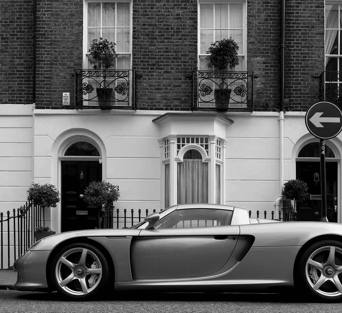 A Porsche outside of a super prime property, managed by The London Management Company